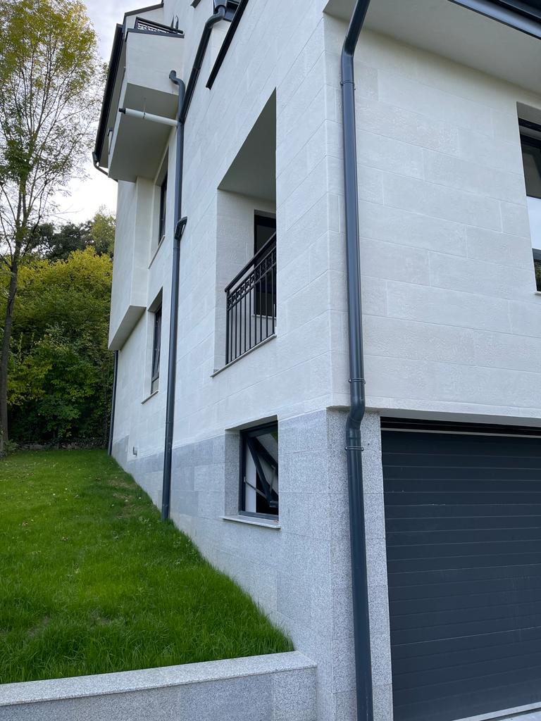 Germany — private house facade clad in flexible panels — 1