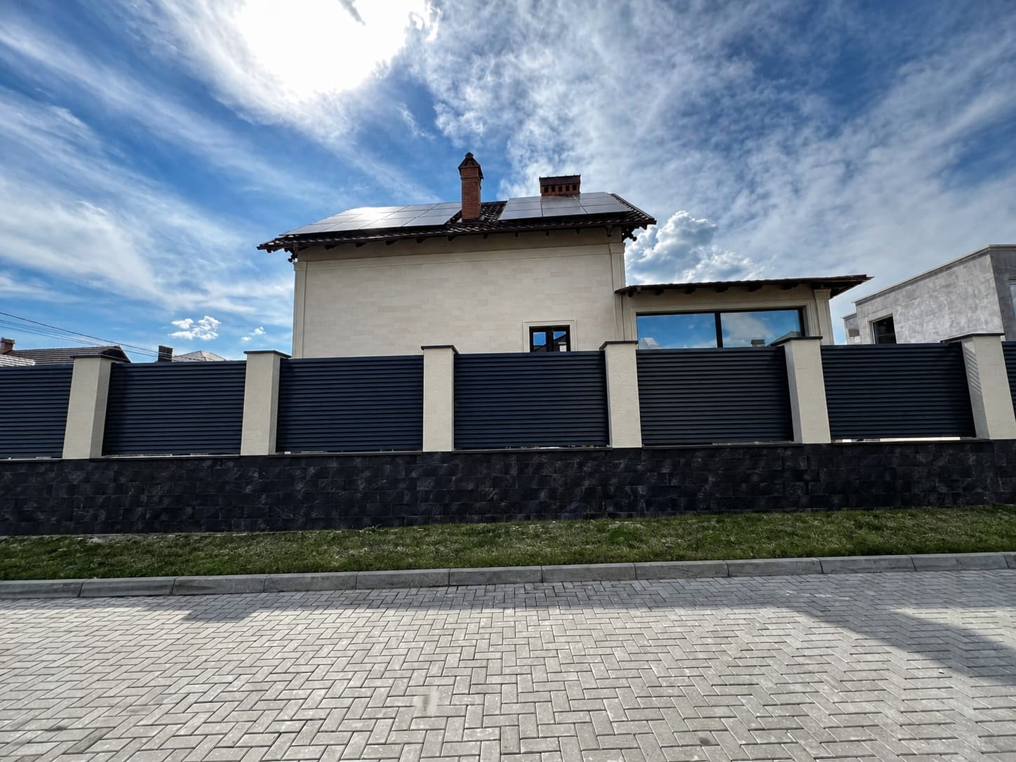 Ialoveni — the facade of a mansion clad in flexible tiles — 10