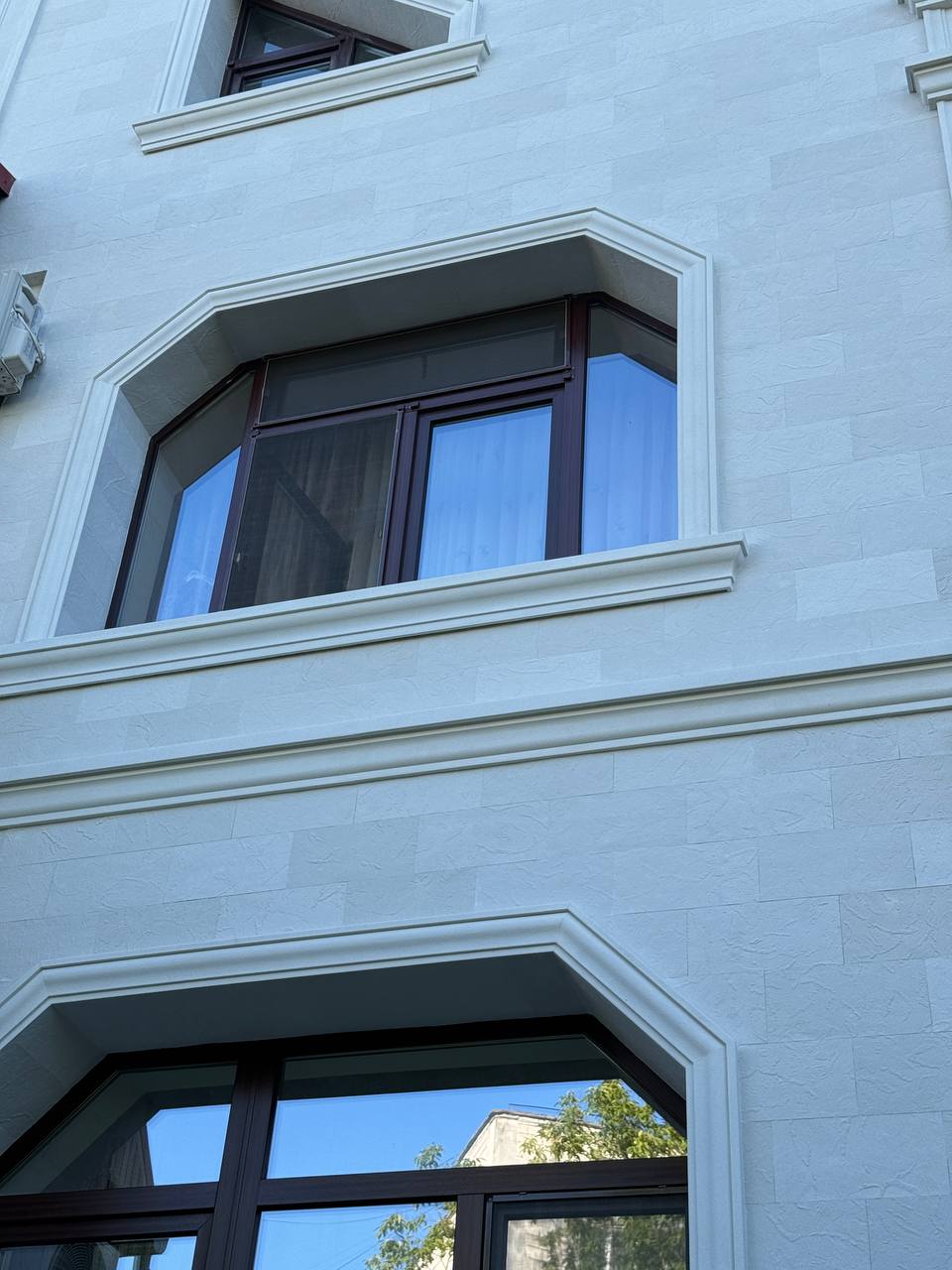 Flexible stone tiles for façades — house in Primaverii — 6
