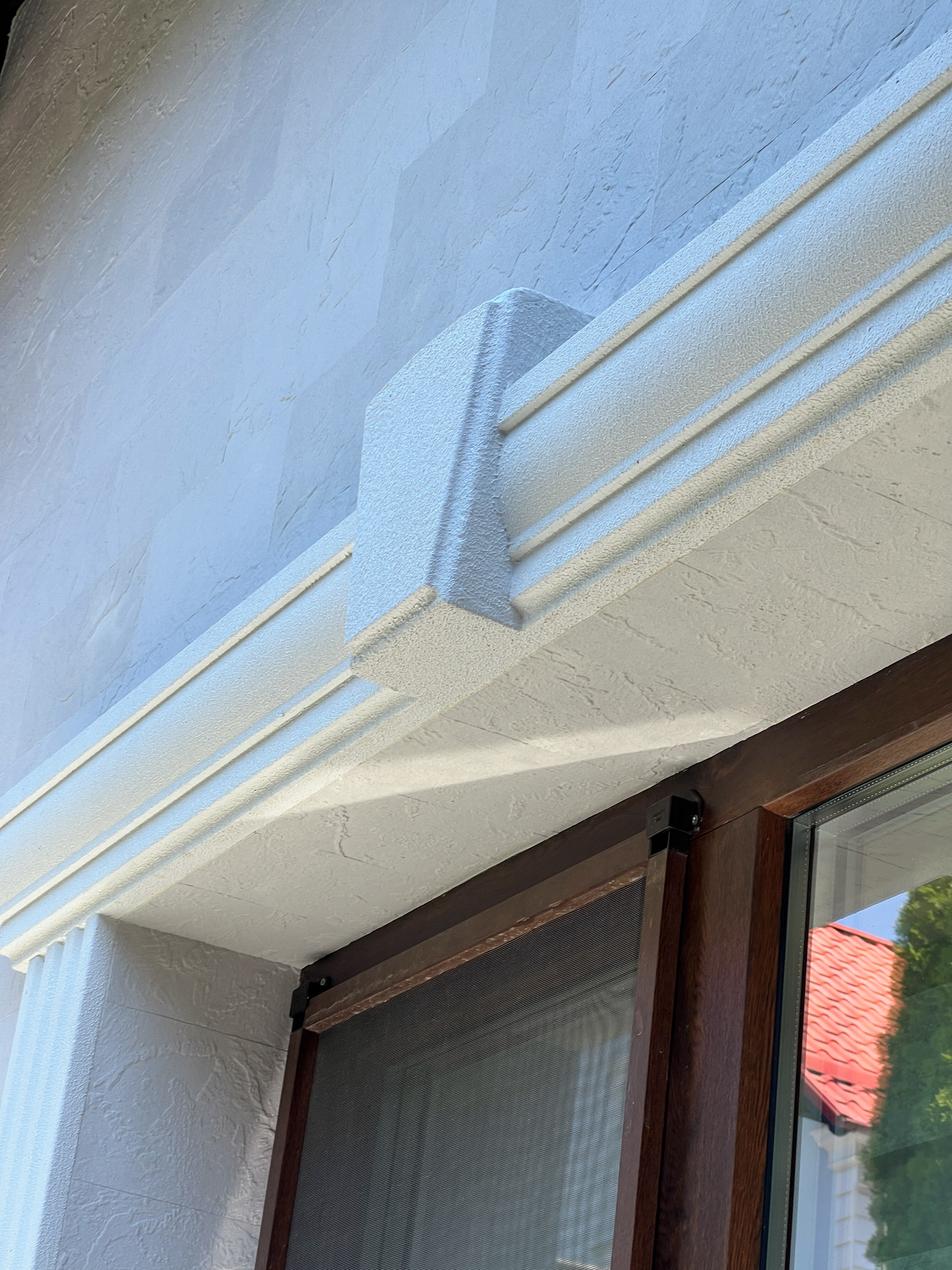 Flexible stone — the extended facade of a complex — 28