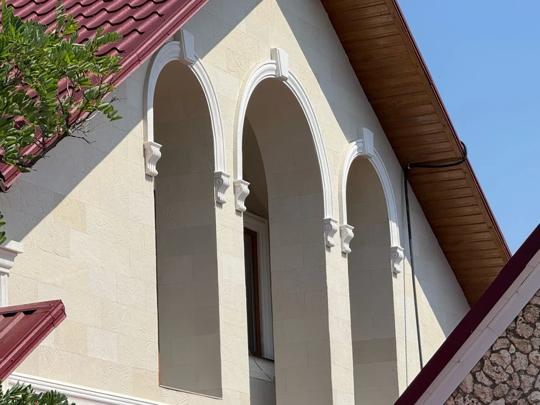 Pletaflex flexible facade cladding — house in Costești